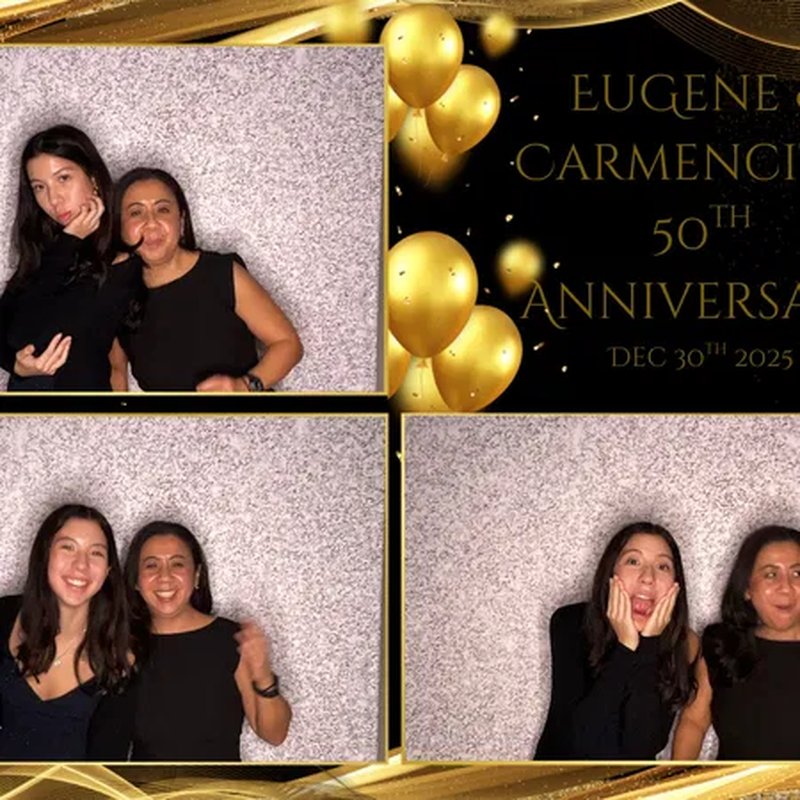 Friends posing at anniversary party photo booth